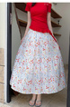 Real Shot of the New 2025 Summer French Tea Break High Waist Elastic Floral Slim Drape A-Line Maxi Skirt in White with Colorful Floral Print