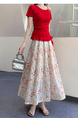 Real Shot of the New 2025 Summer French Tea Break High Waist Elastic Floral Slim Drape A-Line Maxi Skirt in White with Colorful Floral Print