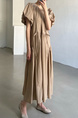 Artistic retro design, simple and fashionable long dress in beige